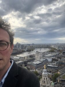 Half-portrait of award winning writer Jason Goodwin, overlooking London